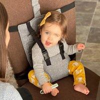 Portable dining chair with fixed straps for babies, infants, and children to eat, seat belts for