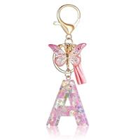 Fmeida Initial Letter Keychains for Women Pink Key Ring with Tassel & Butterfly Charm