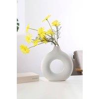 https://www.burton.co.uk/product/living-and-home-13cm-w-x-14cm-h-white-nordic-style-donut-shape-ceramic-vase_p-6ae6e5be-4218-4095-8276-2ff1d396c0db?colour=White&size=One%20Size
