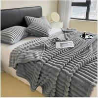 https://www.burton.co.uk/product/living-and-home-reversible-fluffy-striped-throw-blanket_p-b04dcc3b-c5b4-4d4b-a6d8-7892143a1b13?colour=Grey&size=Small