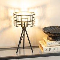 https://www.burton.co.uk/product/valuelights-elise-acrylic-jewel-two-tier-shade-black-tripod-table-lamp_p-5e4b2ddd-4508-4ec0-bb7c-098ca8c07442?colour=Black&size=One%20Size