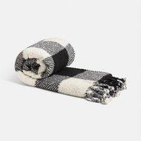 https://www.burton.co.uk/product/ohs-ultra-soft-sherpa-fleece-throw-gingham-tassel-blanket-monochrome_p-c9d0243f-0886-4580-bf9d-036824e9d761?colour=Natural%20White&size=120cm%20x%20150cm