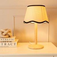 ValueLights Triston Natural Light Wood Stem Table Lamp with Scallop Trim Tapered Lamp Shade in Black