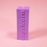 https://www.burton.co.uk/product/flamingo-candles-capricorn-zodiac-block-pillar-candle_p-5292faed-74a2-47fe-bfee-fc59594ba5f3?colour=Purple&size=One%20Size