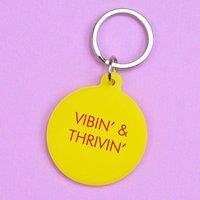 https://www.burton.co.uk/product/flamingo-candles-vibin-thrivin-keyring_p-997e1b98-2083-4391-b787-926d78519410?colour=Yellow&size=One%20Size