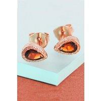 Otis Jaxon London Women's Garnet Teardrop Sterling Silver January Birthstone Stud Earrings in Rose Gold
