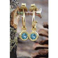 Otis Jaxon London Women's Blue Topaz Sterling Silver November Birthstone Huggie Hoop Earrings in Gold