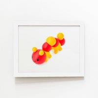 Warren Reed - Designer Rubber Toy Catepillar Framed Art Print in White | Size: W12 x H16