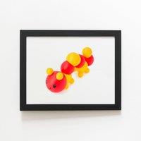 Warren Reed - Designer Rubber Toy Catepillar Framed Art Print in Black | Size: W12 x H16