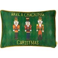 Furn Nutcracker Cracking Christmas Printed Piped Velvet Cushion in Green | Size: 30 cm x 50 cm