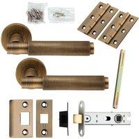 Loops Door Handle & Latch Pack Antique Brass Knurled Round Bar Screwless Round Rose in Metallics