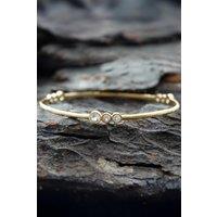 Otis Jaxon London Women's White Topaz Sterling Silver November Birthstone Bangle in Gold