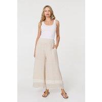 Izabel London Women's Sequin Embellished Wide Leg Trousers in Beige | Size: Medium