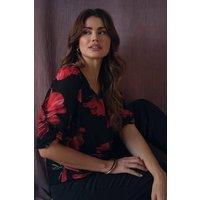 Izabel London Women's Floral Semi Sheer Puff Sleeve Blouse in Black | Size: 12