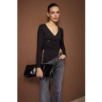 WOVCOR Women's Asymmetric Wrap Front Stretch Knit Blouse with Hardware Detail in Black | Size: Medium