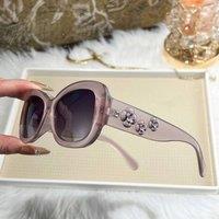 PEACH ACCESSORIES Women's Floral Sculpted Sunglasses in Lilac