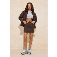 WOVCOR Women's Coated Denim Mini Skirt in Brown | Size: 4