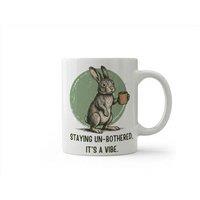 Dyzi Staying Un-Bothered It's a Vibe Funny Rabbit Quote Ceramic Mug in White