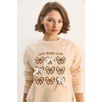 Bianco Lucci Women's Ribbed Printed Crew Neck Long Sleeve Sweatshirt in Beige | Size: Medium