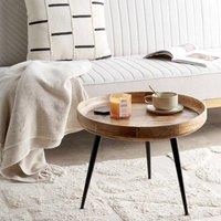 Wyld and Coco Mango Wood Coffee Table - Round Top Raised Edges Black Tripod Base in Brown