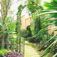 OUTSUNNY Metal Garden Arbor Arch Gate w/ 2 Side Planter Boxes & Vine Frame in Black