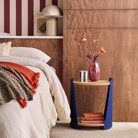 sweeek Curved metal side table or bedside table with wood decor & casters in Blue