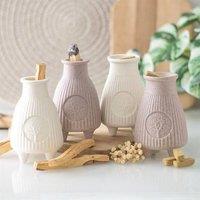 Uniqueful Greige Ribbed Palo Santo Burner in Beige