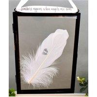 Amaya Rose Ltd In Memory of Baby. Baby Feet Real feather Floating Picture Frame in Black