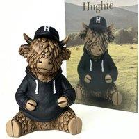Animal Crackers Hughie Wearing A Hoodie & Cap, Highland Cow Collectable Figurine in Brown