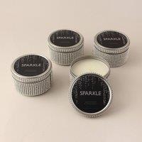 Pack of 4 Sparkle Grapefruit and Patchouli Tin Candles Silver