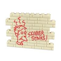 Custom printed Lego Skinner Stinks graffiti wall. Wall of 27 tan colour bricks