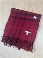 Classic Burberry childrens scarf in a rich red check pattern.