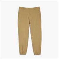 Men's Trousers Lacoste Golf Recycled Polyester Pants in Cream - 38R Regular