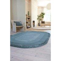 Tonal Border Oval Shaped Rug