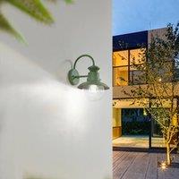 Lindby outdoor wall light Celinor, green, steel, 15 cm