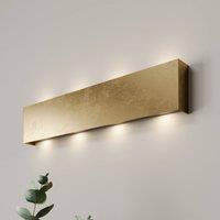Quitani LED wall light Maja, gold antique, width 54 cm