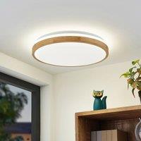 Lindby LED ceiling lamp Emiva, 49 cm, CCT, wood