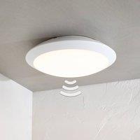 Lindby Naira LED outdoor ceiling lamp, white, sensor, 30 cm, IP65