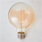 Lindby E27 LED globe bulb filament 6W 500lm, amber 1,800K