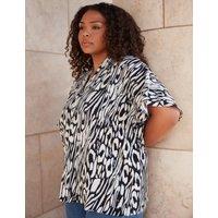 Animal Print V-Neck Relaxed Blouse