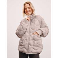 Beyond Yoga 2-Way Reversible Quilted Puffer Jacket Nude