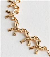 Gold Tone Bow Charm Necklace New Look