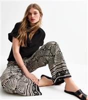 Women's Black Crepe Shell Print Wide Leg Trousers New Look