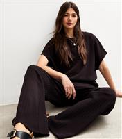 Women's Soft Touch Dark Brown Textured Wide Leg Trousers New Look