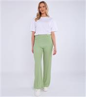 Women's Green Textured Flared Trousers Gini London New Look
