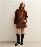 Women's Brown Corduroy Pleated Buckle Mini Skirt New Look
