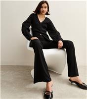 Women's Black Ribbed Jersey Flared Trousers New Look