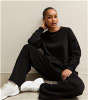 Women's Petite Black Oversized Crew Neck Sweatshirt New Look