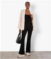 Women's Black Flared Jersey Trousers Apricot New Look