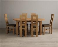 Extending Caversham Oak Oval Dining Table with 8 Cream Natural Solid Oak Chairs